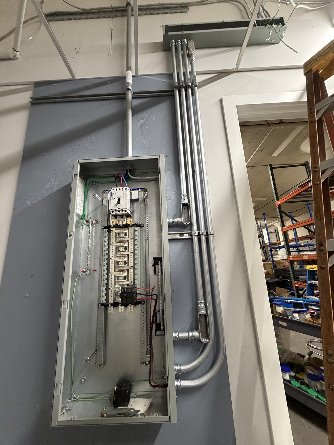 Commercial electrical panel and EMT conduit installation